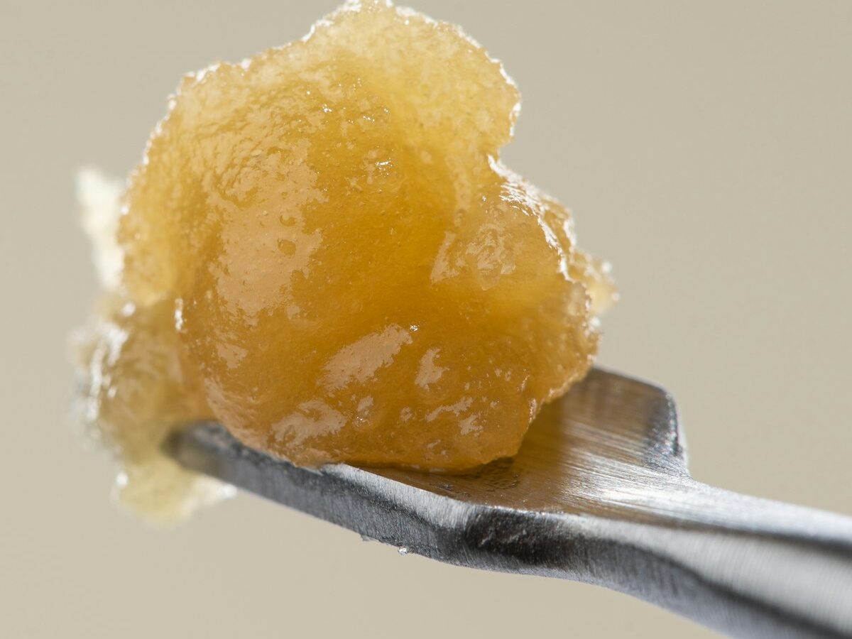 Extraction Products a close up of a spoon with sugar on it